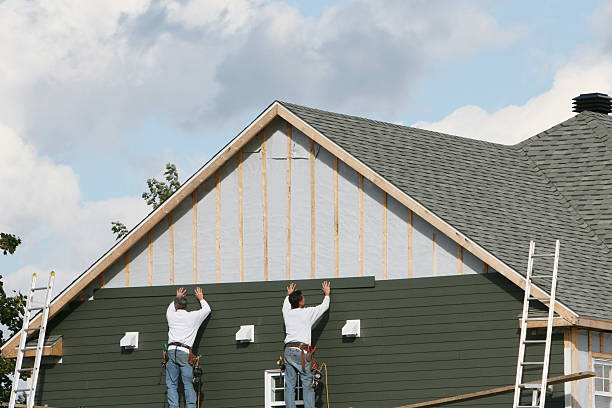 Professional Siding Installation technician working in Spring Valley, NY